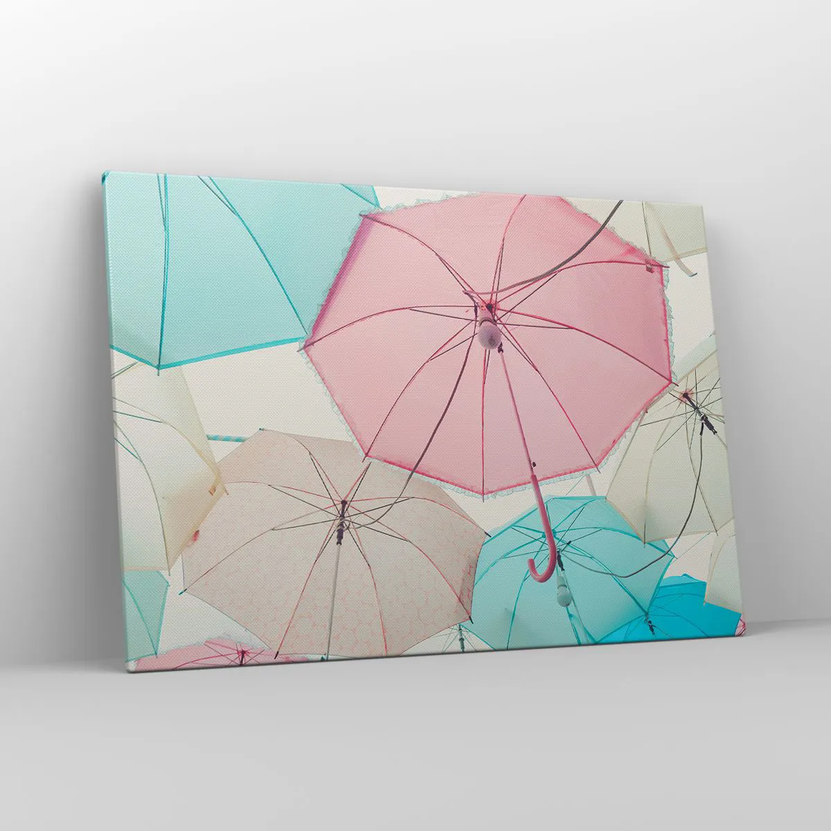 Obraz na płótnie - Pastelowe parasolki na tle jasnego nieba - 100x70cm - Czasem słońce, czasem deszcz - Nowoczesna dekoracja ścienna do salonu, kuchni i sypialni ARTTOR