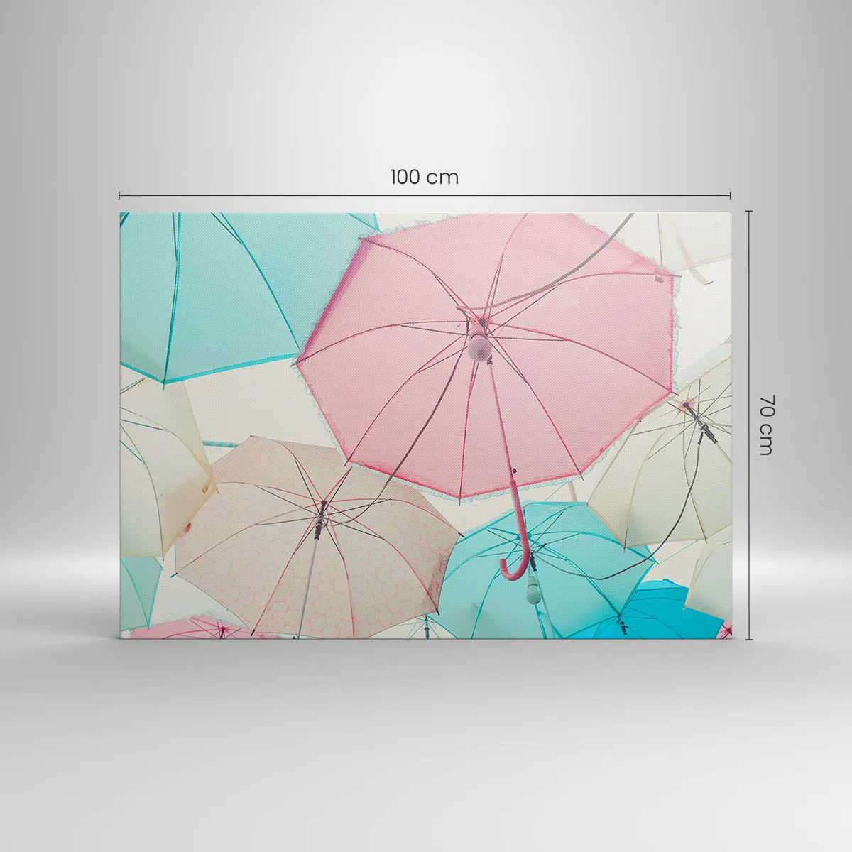 Obraz na płótnie - Pastelowe parasolki na tle jasnego nieba - 100x70cm - Czasem słońce, czasem deszcz - Nowoczesna dekoracja ścienna do salonu, kuchni i sypialni ARTTOR