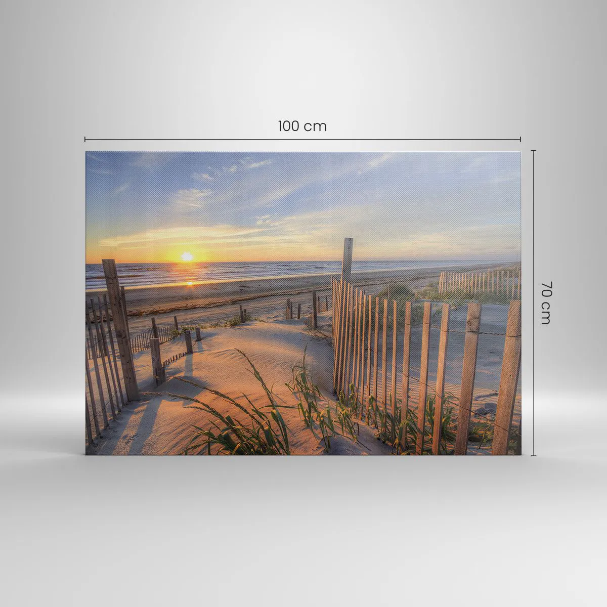 Obraz na płótnie - Plaża o zachodzie słońca z drewnianym ogrodzeniem - 100x70cm - Blask i cień wiatru - Nowoczesna dekoracja ścienna do salonu, kuchni i sypialni ARTTOR