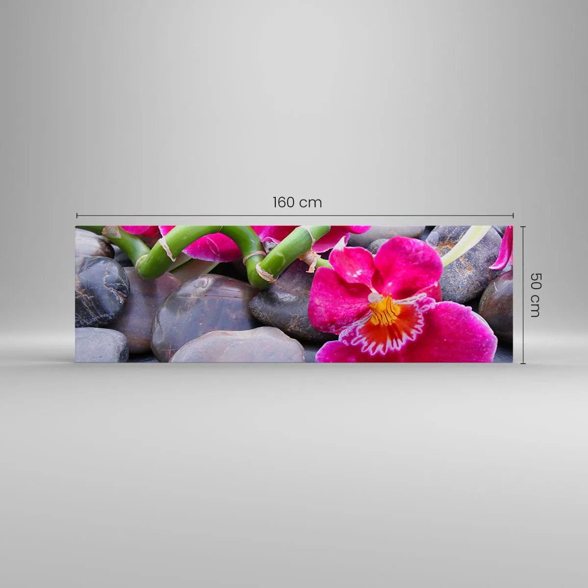 Obraz na płótnie - Różowe orchidee na tle gładkich kamieni - 160x50cm - Chłód i żar - Nowoczesna dekoracja ścienna do salonu i sypialni ARTTOR