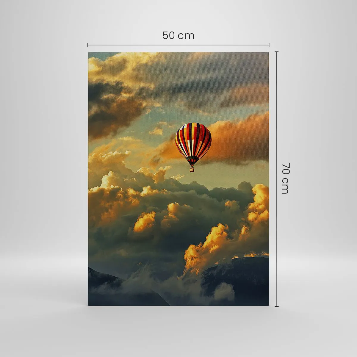 Bild auf Leinwand - Leinwandbild - Ein Ballon vor dem Hintergrund dramatischer Wolken - 50x70cm - Ich fliege, weil ich es will - Moderne Wanddekoration für Wohnzimmer und Schlafzimmer ARTTOR