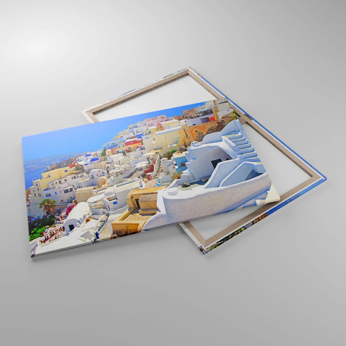 Obraz na płótnie - Panorama Santorini z białymi domami i błękitnym niebem - 100x70cm - Marzenie o greckim lecie - Nowoczesna dekoracja ścienna do salonu, kuchni i sypialni ARTTOR