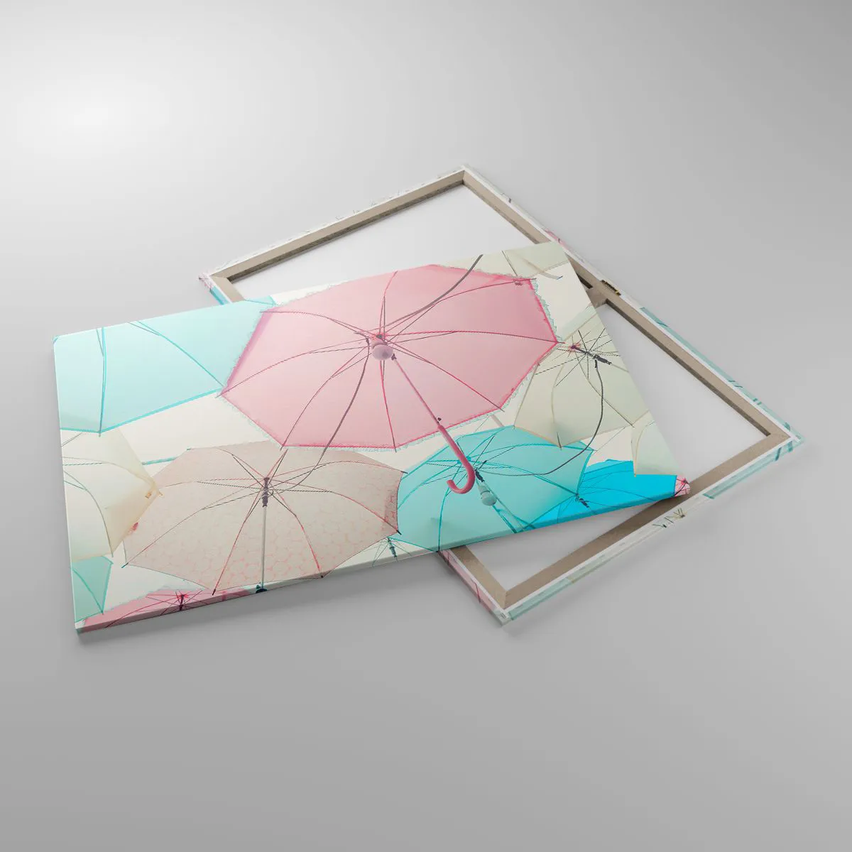 Obraz na płótnie - Pastelowe parasolki na tle jasnego nieba - 100x70cm - Czasem słońce, czasem deszcz - Nowoczesna dekoracja ścienna do salonu, kuchni i sypialni ARTTOR