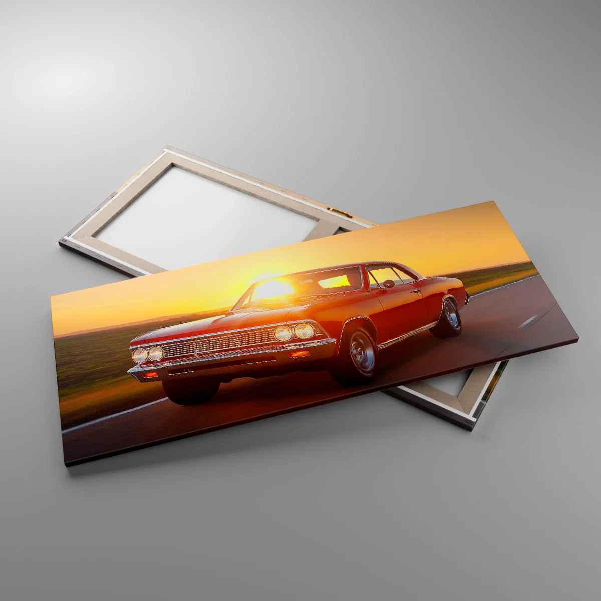 Bild auf Leinwand - Leinwandbild - Ein rotes Auto in der untergehenden Sonne auf einer offenen Straße - 120x50cm - Begehren ist rot - Moderne Wanddekoration für Wohnzimmer und Schlafzimmer ARTTOR