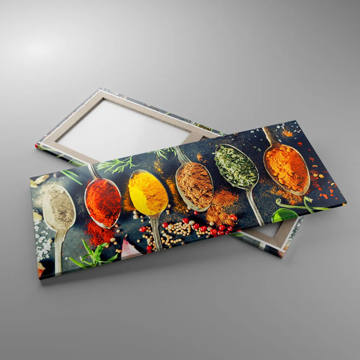 Obraz na płótnie - Kolorowe przyprawy na łyżkach z ziołami w tle - 120x50cm - Kulinarna magia - Nowoczesna dekoracja ścienna do salonu i sypialni ARTTOR