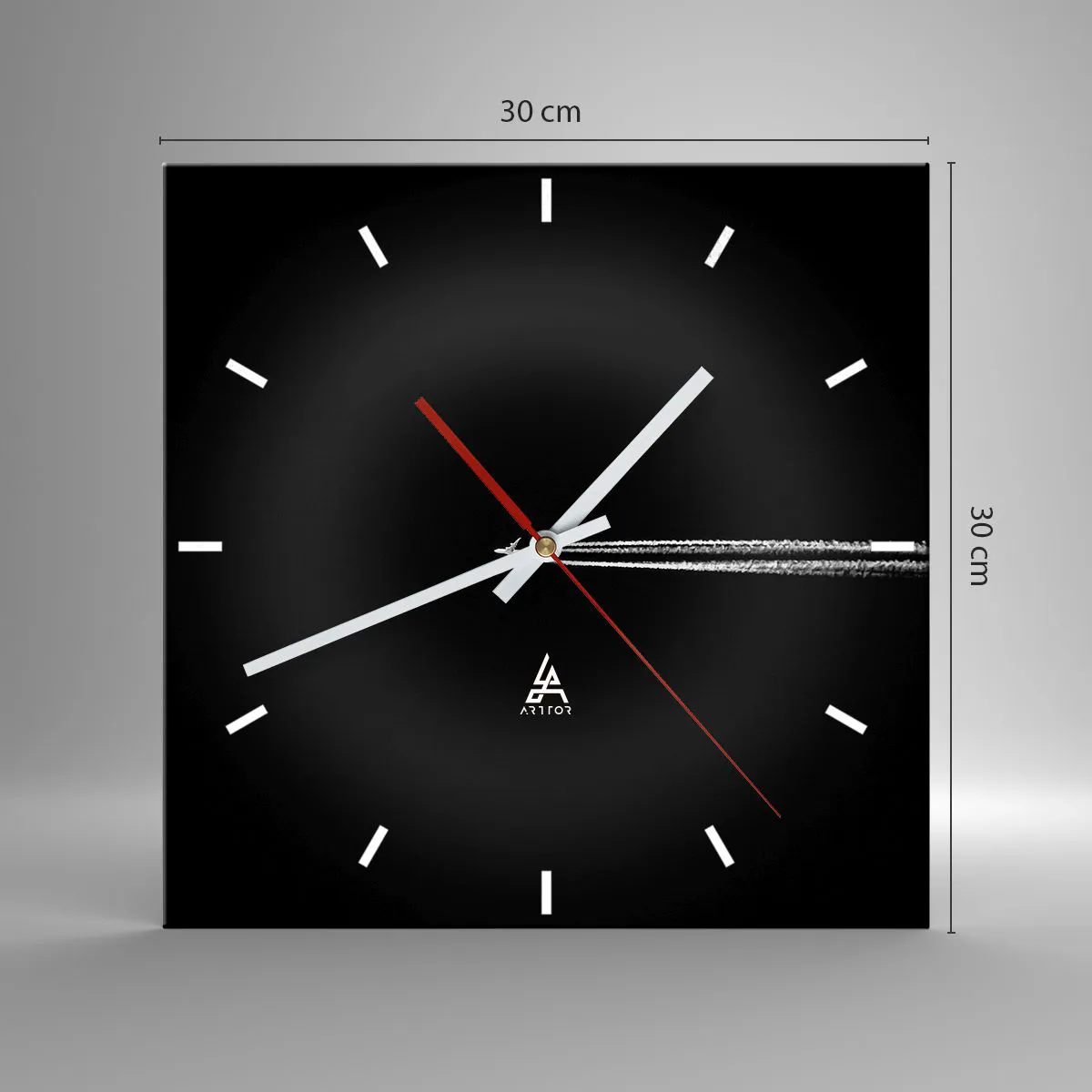 Horloge murale - Pendule murale - Un avion à réaction avec une traînée de condensation visible sur fond noir - 30x30cm - Dans une autre dimension - Décoration murale moderne pour le salon et la chambre ARTTOR