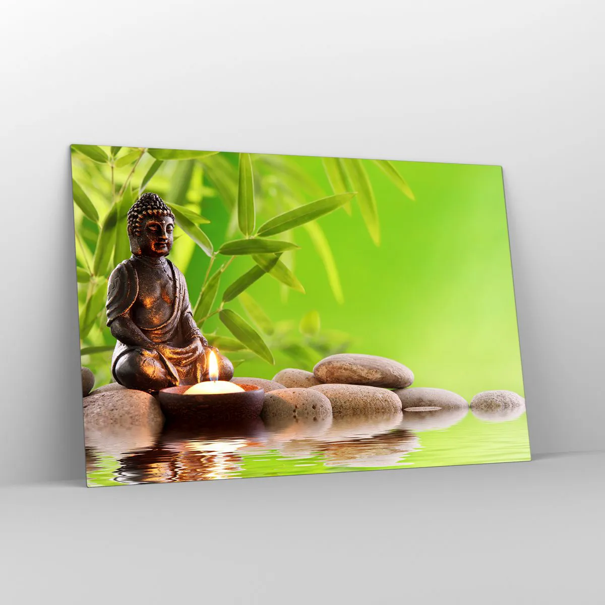 Impression sur verre - Image sur verre - Une figure de Bouddha avec une bougie allumée dans un cadre verdoyant - 120x80cm - La vie est belle - Décoration murale moderne pour le salon et la chambre ARTTOR