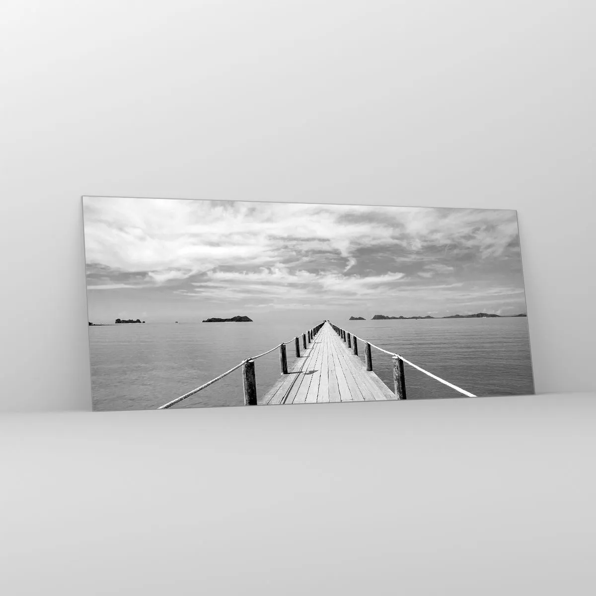 Obraz na szkle - Drewniane molo prowadzące w dal nad spokojnym morzem - 120x50cm - A może podróż… - Nowoczesna dekoracja ścienna do salonu i sypialni ARTTOR