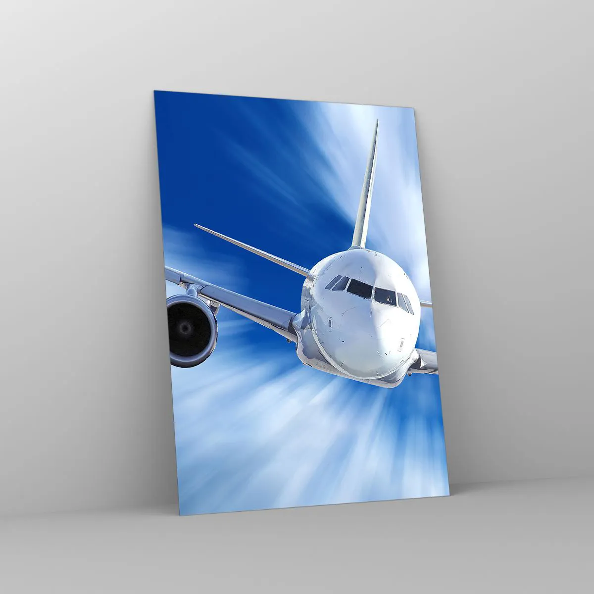 Obraz na szkle - Samolot pasażerski na tle błękitnego, dynamicznego nieba - 50x70cm - Szybszy niż wiatr na niebie - Nowoczesna dekoracja ścienna do salonu, kuchni i sypialni ARTTOR