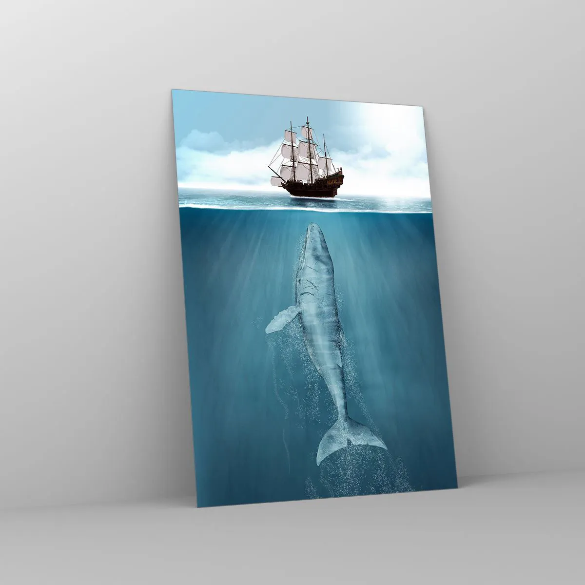 Obraz na szkle - Statek żaglowy na powierzchni oceanu, pod nim zanurzony wieloryb - 70x100cm - Lepiej nie wiedzieć - Nowoczesna dekoracja ścienna do salonu i sypialni ARTTOR