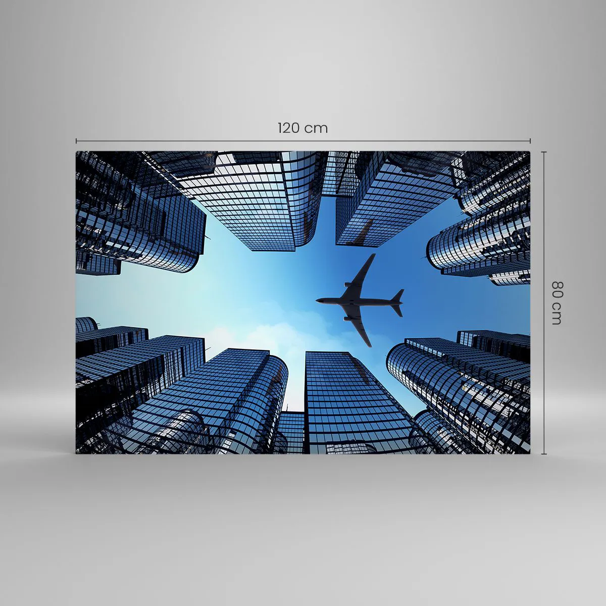 Glasbild - Bild auf glas - Blick auf das Flugzeug zwischen Wolkenkratzern - 120x80cm - Der Blick aus der Glasschlucht - Moderne Wanddekoration für Wohnzimmer und Schlafzimmer ARTTOR