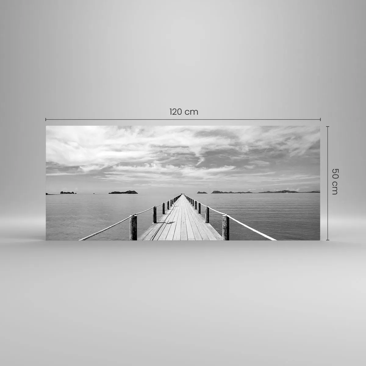 Obraz na szkle - Drewniane molo prowadzące w dal nad spokojnym morzem - 120x50cm - A może podróż… - Nowoczesna dekoracja ścienna do salonu i sypialni ARTTOR