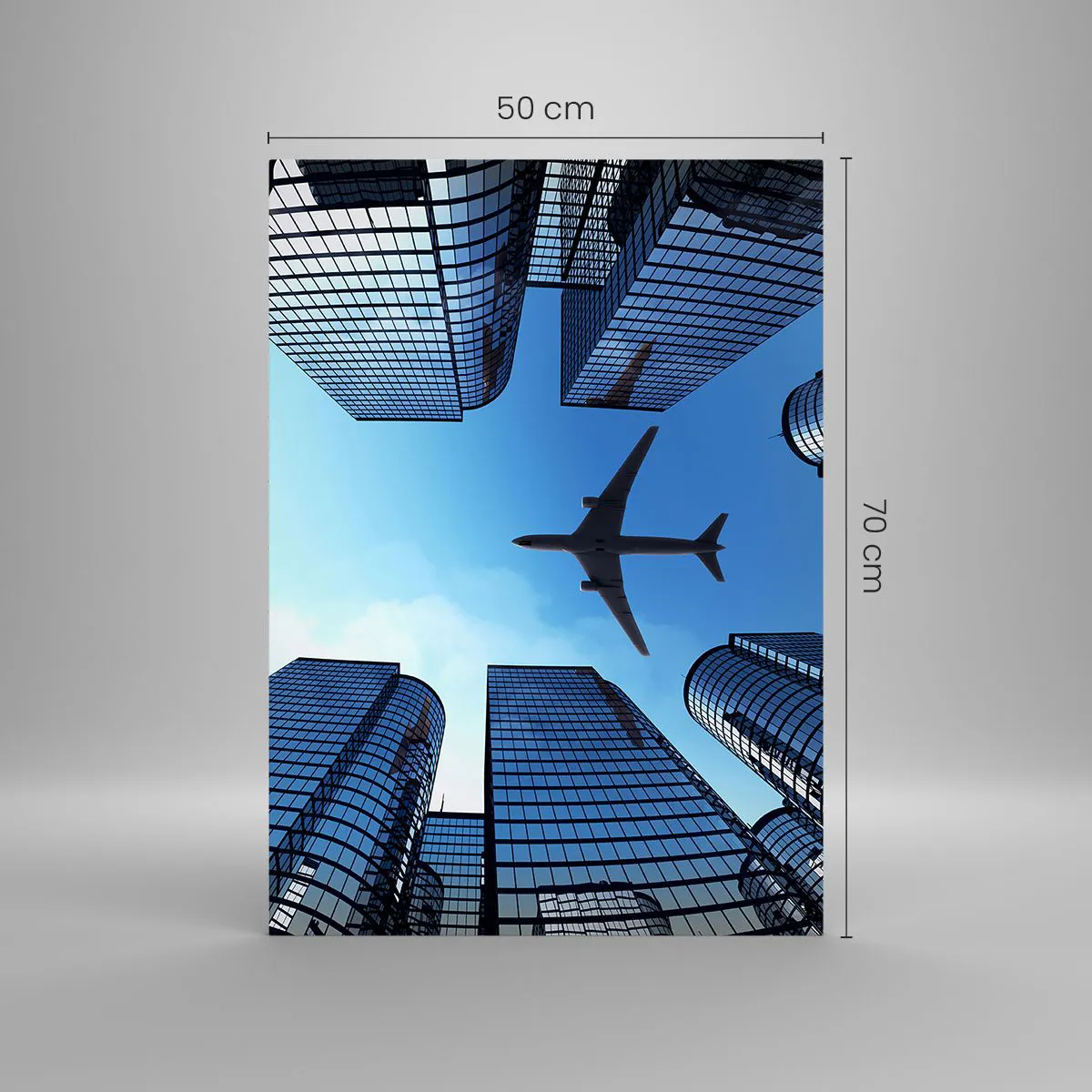 Impression sur verre - Image sur verre - Vue de l'avion entre les gratte-ciels - 50x70cm - La vue depuis le ravin de verre - Décoration murale moderne pour le salon et la chambre ARTTOR