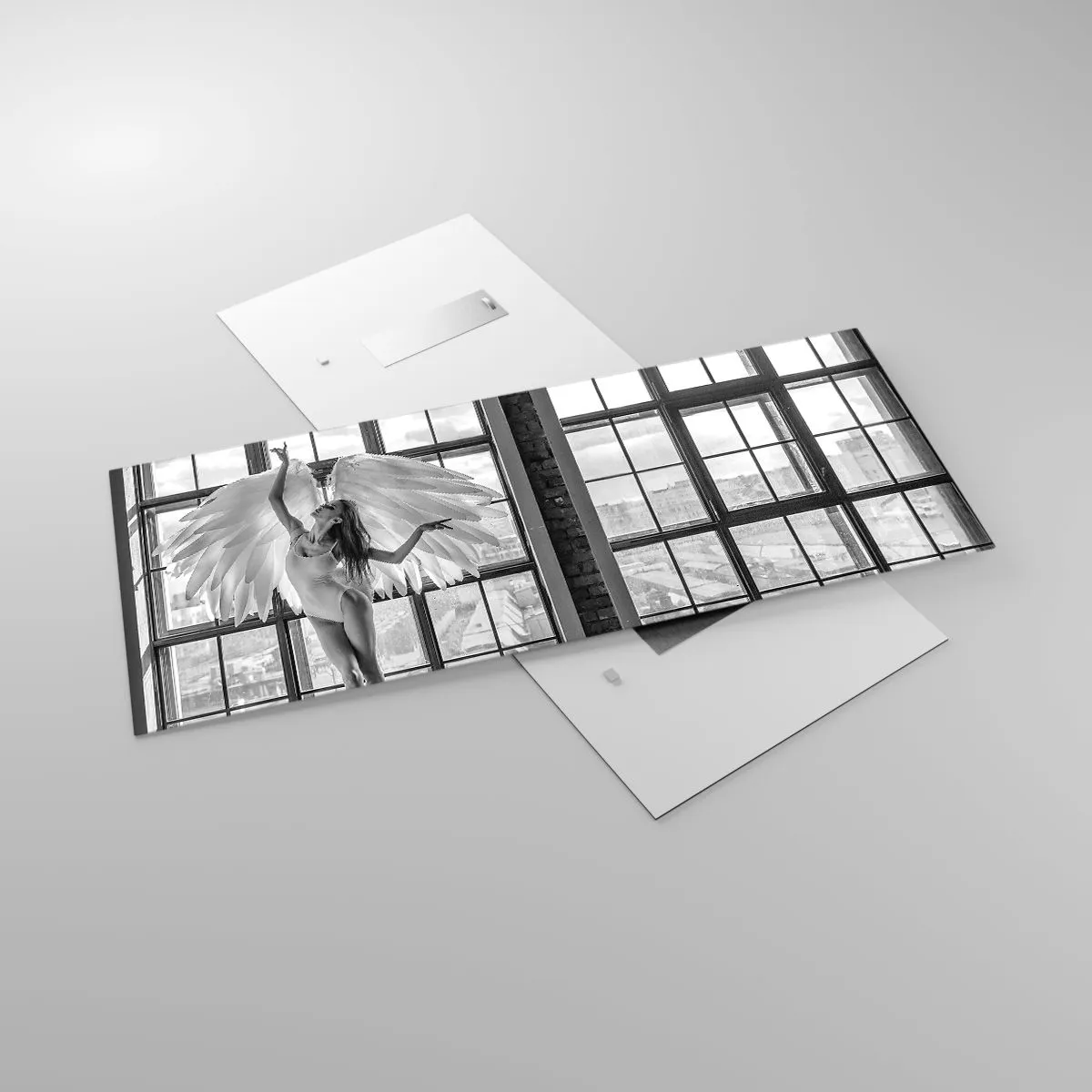 Tablou pe sticlă - Orașul îngerilor dansatori? - 120x50 cm