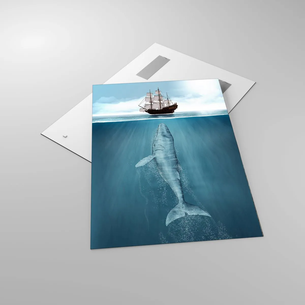 Obraz na szkle - Statek żaglowy na powierzchni oceanu, pod nim zanurzony wieloryb - 70x100cm - Lepiej nie wiedzieć - Nowoczesna dekoracja ścienna do salonu i sypialni ARTTOR