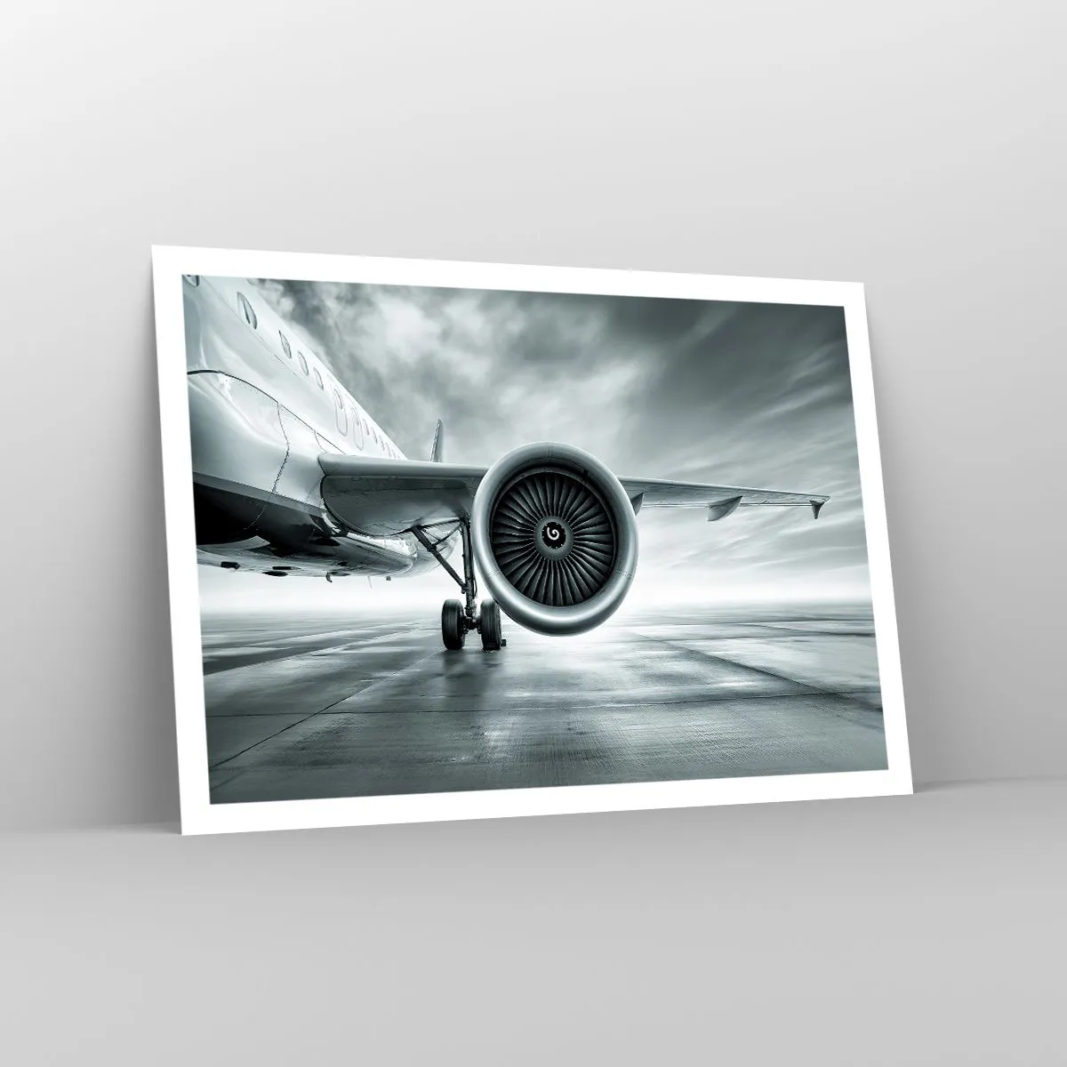 Plakat - Silnik odrzutowy samolotu na płycie lotniska - 100x70cm - Jest moc! - Nowoczesna dekoracja ścienna do salonu i sypialni ARTTOR