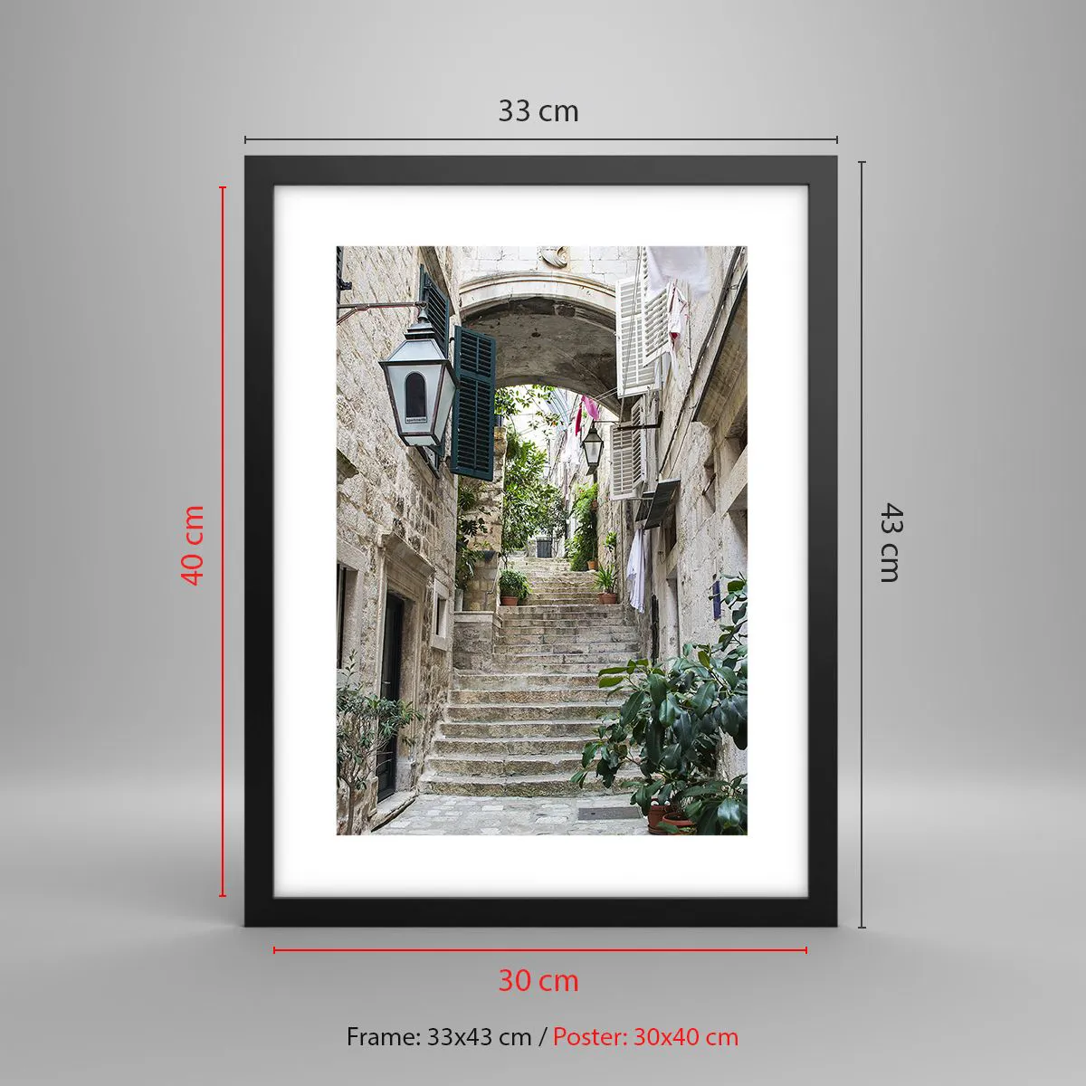 Plakat i sort ramme - En charmerende baggyde - 30x40 cm