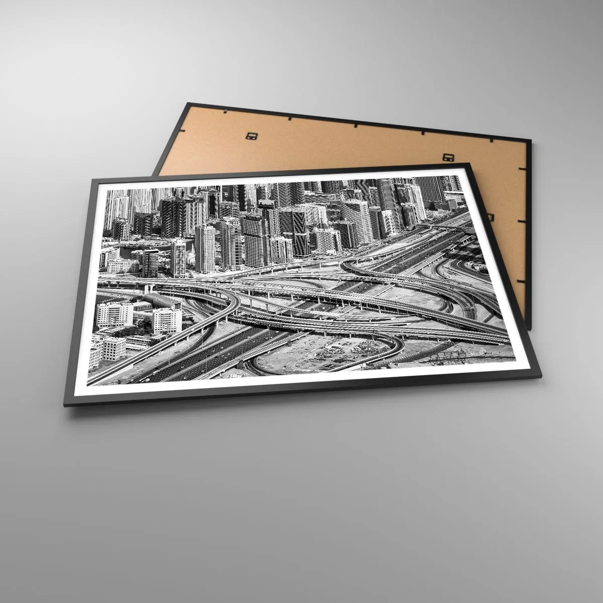 Poster in einem schwarzem Rahmen - Dubai aus der Vogelperspektive - 100x70cm - Dubai - die unmögliche Stadt - Moderne Wanddekoration für Wohnzimmer und Schlafzimmer ARTTOR