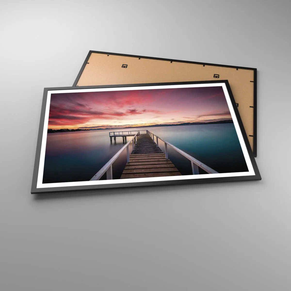 Poster in einem schwarzem Rahmen - Die sanfte Flamme des Abends - 91x61 cm