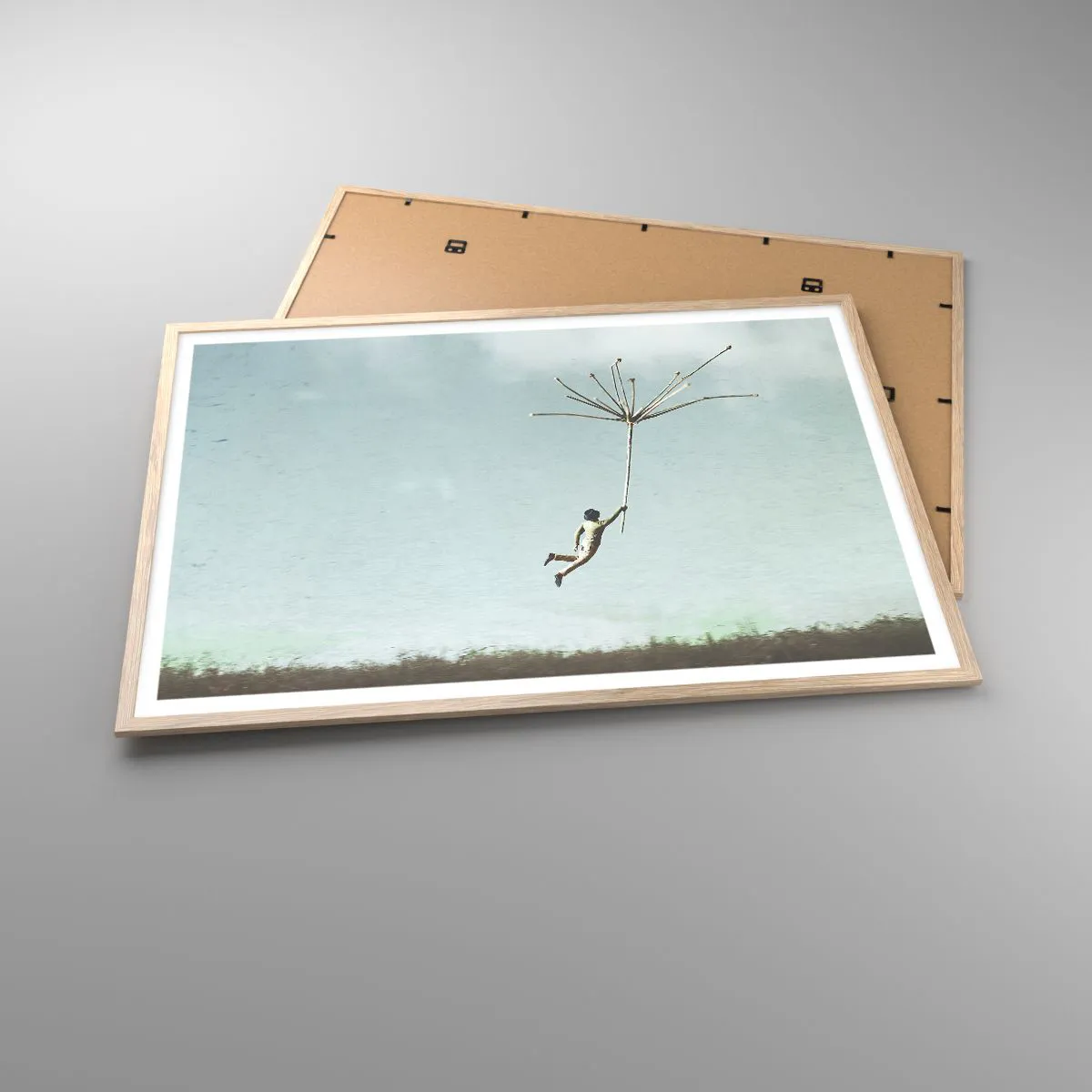 Poster in einem Rahmen aus heller Eiche - Drachen, Löwenzahn, Wind - 100x70 cm