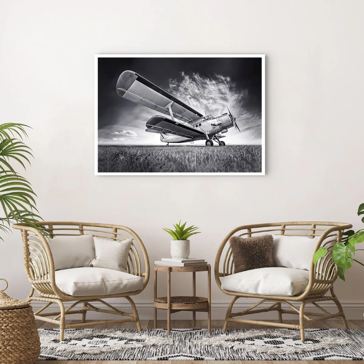 Poster - Un aereo contro un cielo drammatico in bianco e nero - 100x70cm - Giramondo alato - Decorazione murale moderna per soggiorno e camera da letto ARTTOR