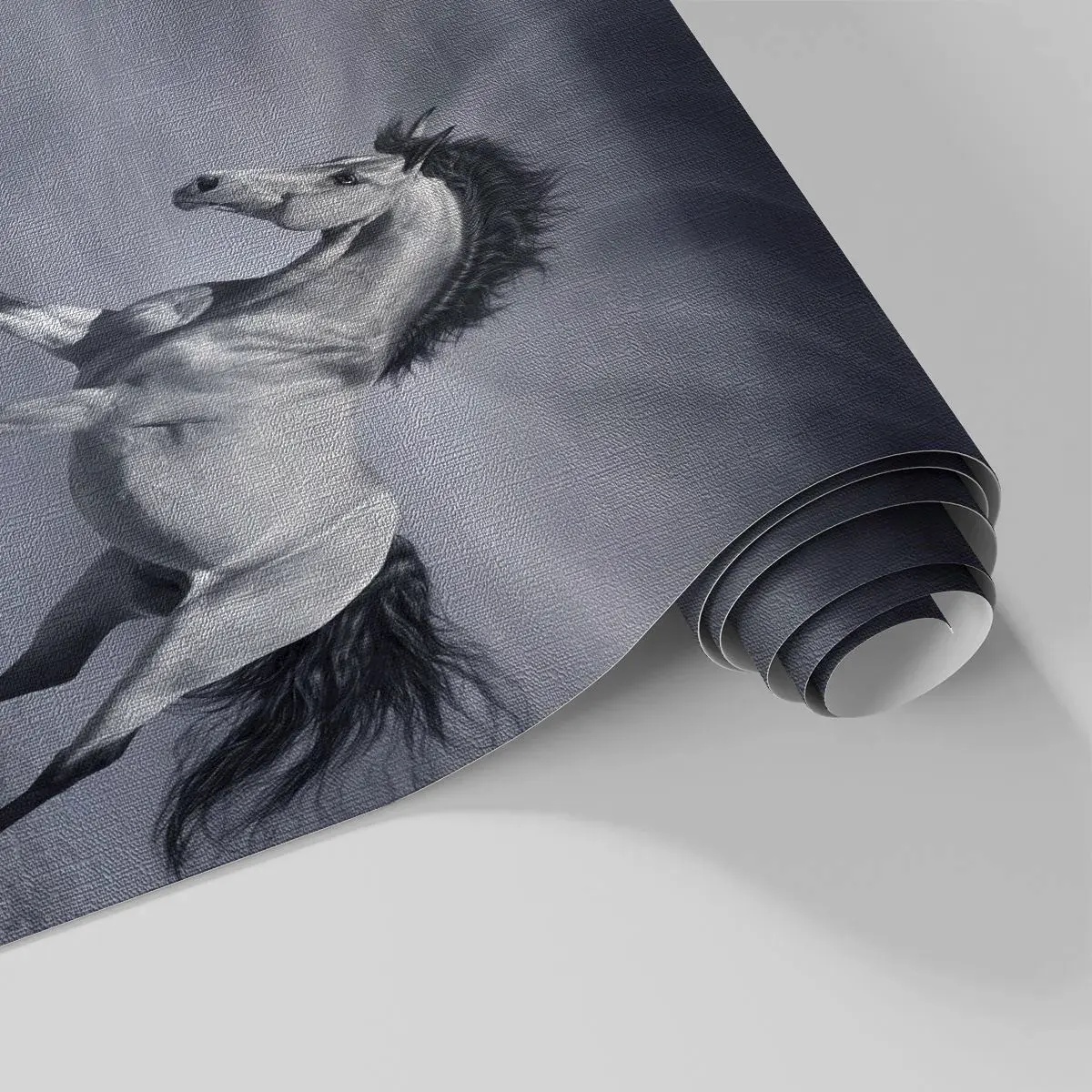 Fototapete Premium Canvas - Ein schwarz-weißes Pferd in einer dynamischen Pose in der Wüste. - 100x70cm - Geboren um Freude zu bereiten - Moderne Wanddekoration für Wohnzimmer und Schlafzimmer ARTTOR